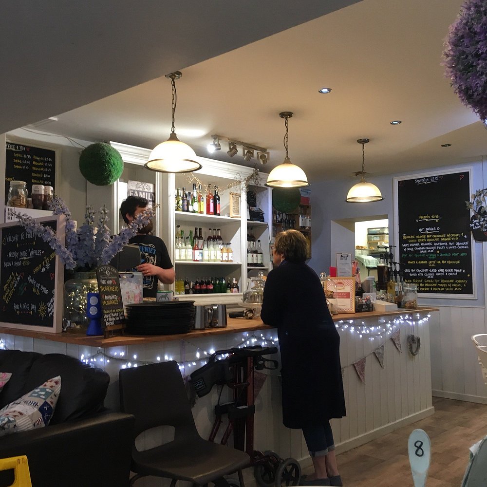 The welcoming counter and cafe interior at Finley Browns